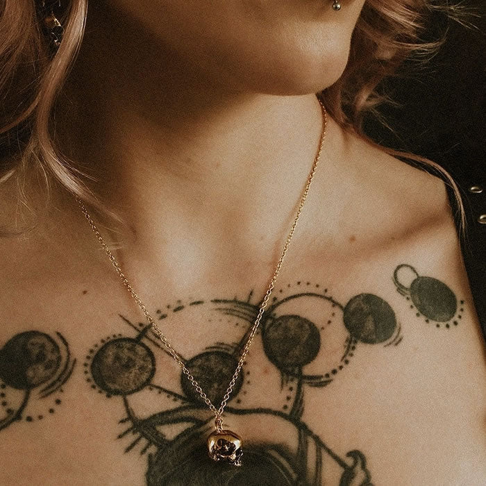 Gold skull necklace