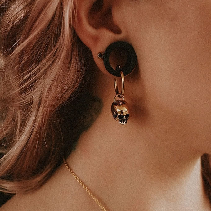 Gold skull hoop earrings